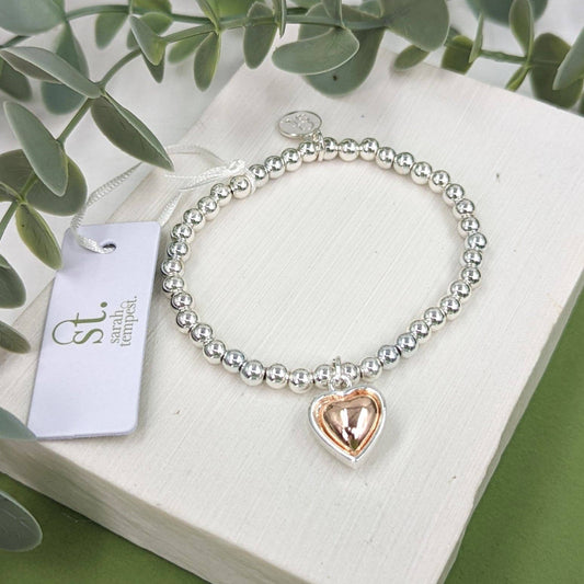 Beaded bracelet with 2 tone heart charm: SIL-RG